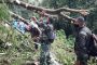 Kerjasama Anggota Polres Minahasa, BPBD dan Masyarakat Singkirkan Pohon Tumbang di Kelurahan Wulauan