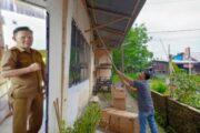 Pemdes Tumpaan Satu Realisasikan Dana Desa untuk Renovasi Balai Desa